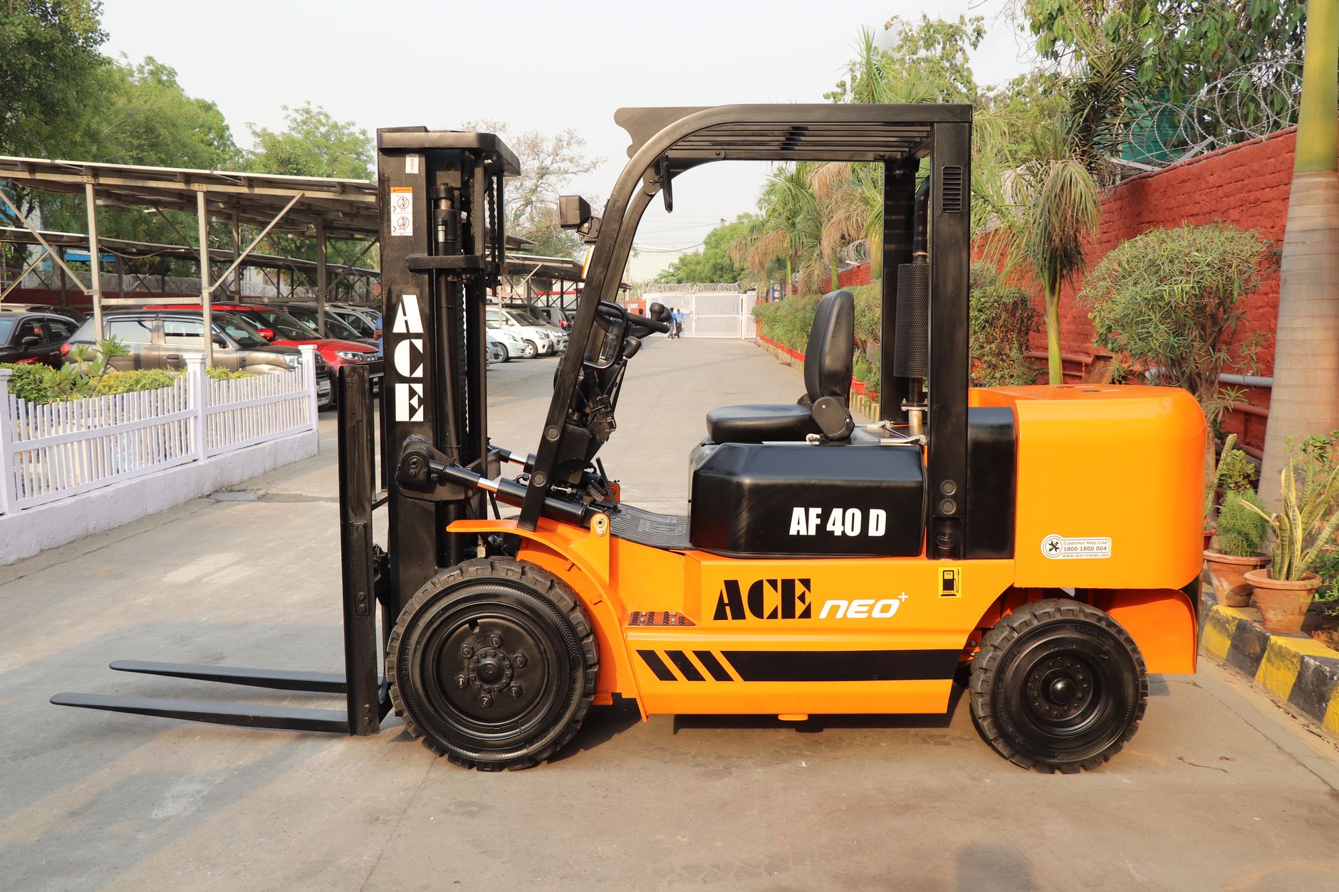 Side view of an ACE AF 40D forklift truck parked outdoors in Palwal, India.